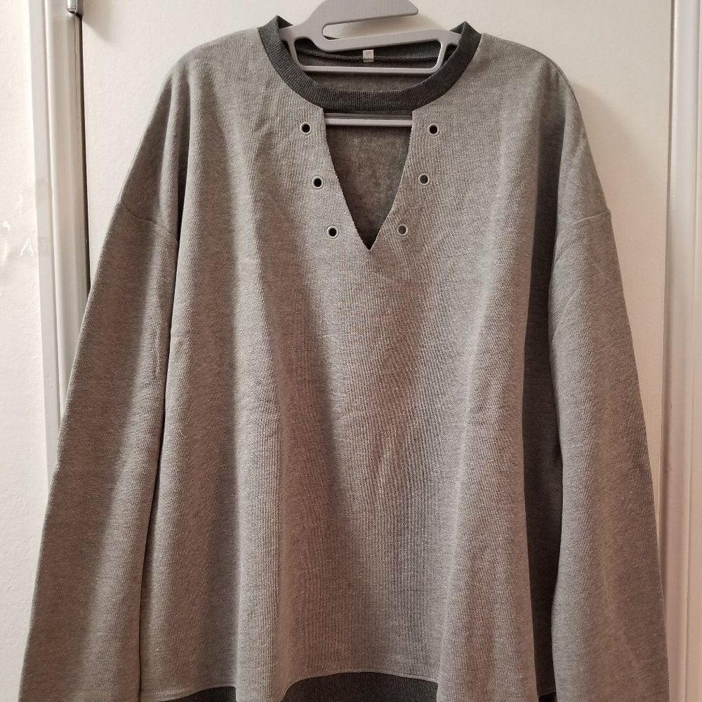 Front neck cut out with eyelets and contrast cuff and binding sweatshirt